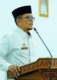 Asisten I Setda, M. Rifa’i, menyampaikan sambutan dalam kegiatan sosialisasi Rencana Aksi Gerakan Bersama Memuliakan Ahli Kubur